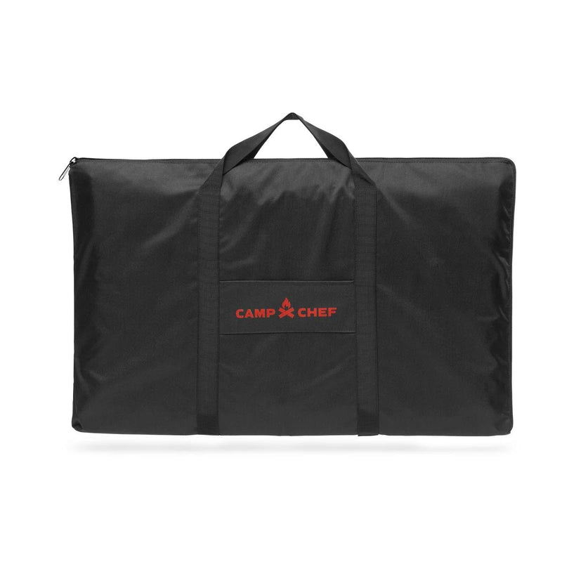 Load image into Gallery viewer, The Camp Chef Griddle Bag 16 - 2 Burner is a black rectangular bag with a zipper, two handles, a front pocket, and the red Camp Chef logo. This weather-resistant bag protects your griddle during transport.
