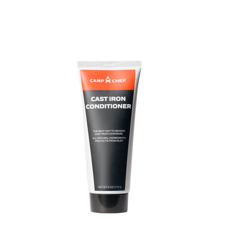Load image into Gallery viewer, A tube of Camp Chef Cast Iron Conditioners with a red and black label stands upright on a white background, used for seasoning and protecting cast iron cookware such as Dutch ovens.

