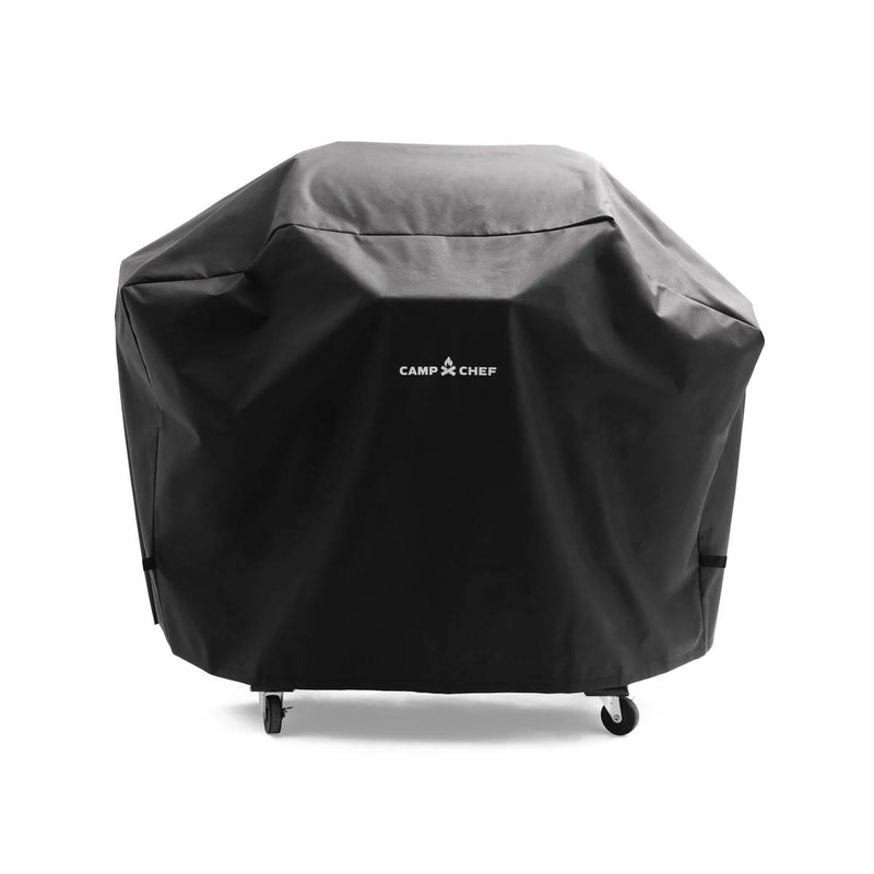 Load image into Gallery viewer, A Camp Chef Woodwind Pro Cover in black with a bold white logo protects your grill from dust and weather. The cover fits over a four-wheeled grill, keeping your Camp Chef appliance safe outdoors.
