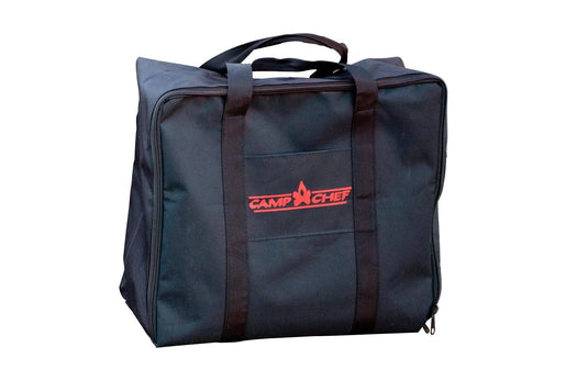 The Camp Chef 14" x 16" Carry Bag is a black, square bag with two handles and a red Camp Chef logo on the front, ideal for transporting your cooking system accessories. Shown on a white background.
