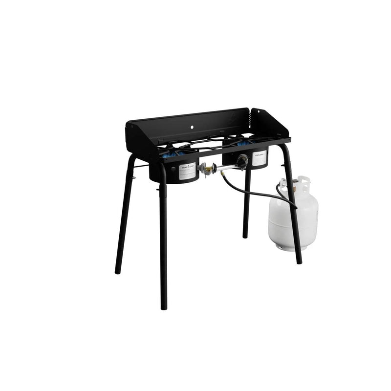 Load image into Gallery viewer, The Camp Chef Explorer, a black metal cooking system with two burners and a propane tank, stands on four legs against a white background—ideal for outdoor cooking.
