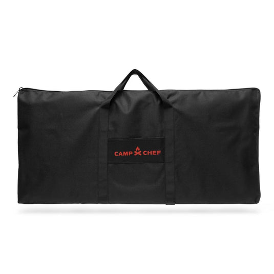 The Camp Chef Griddle Bag 14 - 2 Burner is a large black bag with two handles and an EZ glide zipper, featuring red "CAMP CHEF" text on the front.