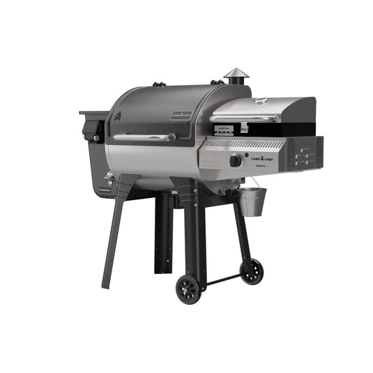 The Camp Chef Woodwind 24 is a black and silver pellet grill and smoker with a WIFI controller, chimney, pellet hopper, side shelf, two wheels for mobility, plus main and side cooking chambers for added versatility.