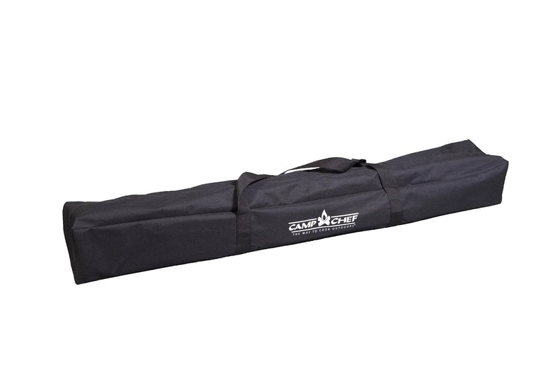 Load image into Gallery viewer, A long black rectangular carrying bag with two handles and the Camp Chef logo in white, designed to store the Mesa Aluminum Camp Table by Camp Chef, shown against a plain white background.

