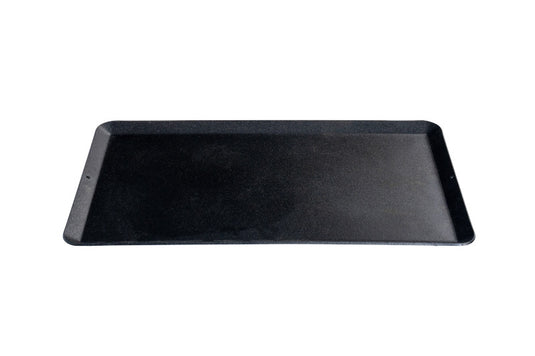 A black rectangular Compact Stove Griddle by Camp Chef with slightly raised edges, shown from above on a white background—ideal for the Mountain Series.