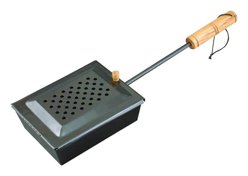 Load image into Gallery viewer, The Camp Chef Popcorn Popper features a metal body, wooden handle, and perforated lid—perfect for making fresh popcorn over a campfire or open flame.
