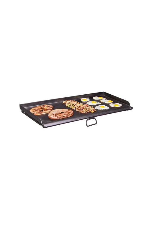 Camp Chef Griddles 16, a rectangular black griddle, shown on a white background with pancakes, bacon, and sunny-side-up eggs cooking on its surface.